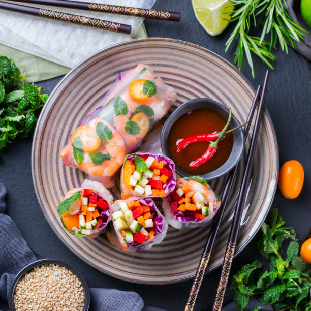 istock Spring or summer rolls, tasty asian food 1248720852