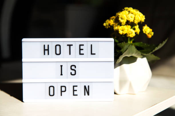 istock White lightbox with greeting text message Hotel is open. End of quarantine concept. 1248720869