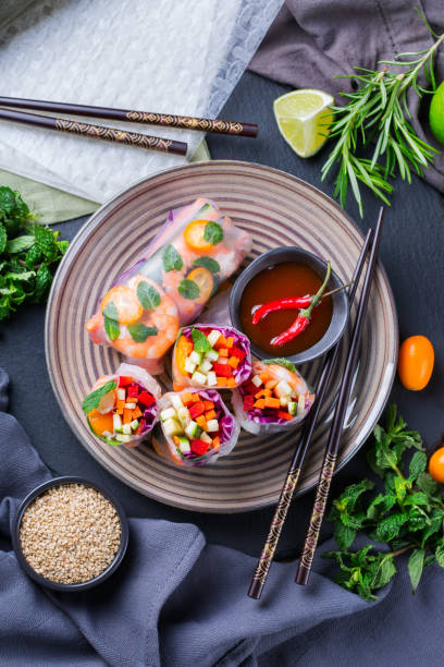 istock Spring or summer rolls, tasty asian food 1248721346