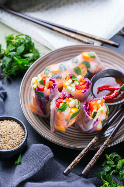 istock Spring or summer rolls, tasty asian food 1248721347