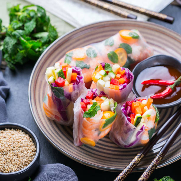 istock Spring or summer rolls, tasty asian food 1248722544