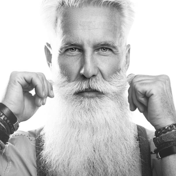 istock Handsome bearded senior man on white background 1248722568