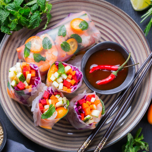 istock Spring or summer rolls, tasty asian food 1248722585