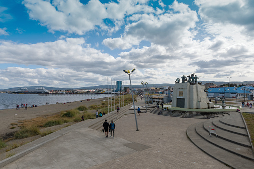 punta arenas, chile-february 10, 2020: Walkers on the Punta Arenas waterfront