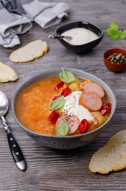 istock Soup with rice and beans, sausages and vegetables 1248723041