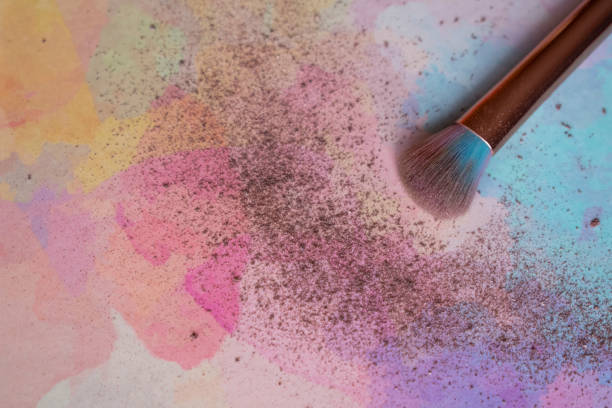 istock Make up brush with powder on colorful background. Copy space 1248726893