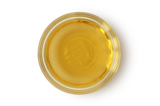 istock Apple cider vinegar in glass bowl on white background 1248727025
