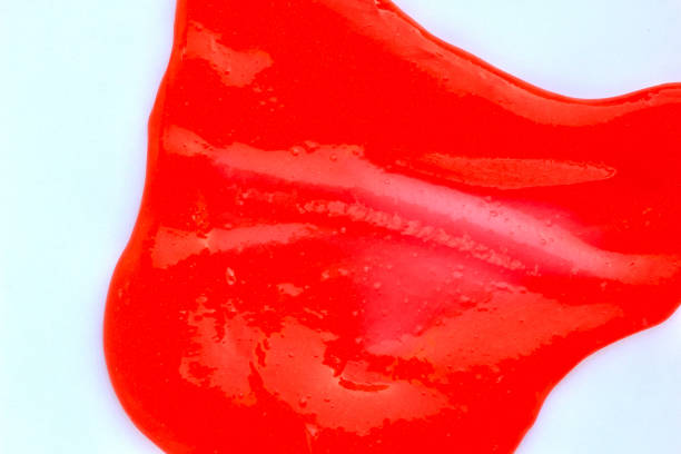 istock Bright red slime on white background. Education, creativity, childhood concept. Selective focus. 1248728643