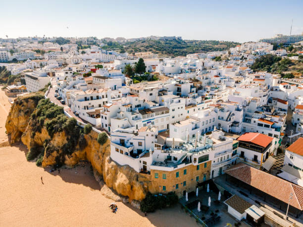 Aerial view of seaside Albufeira in Algarve, Portugal. Aerial view of seaside Albufeira with wide beach and white architecture, Algarve, Portugal. albufeira photos stock pictures, royalty-free photos & images