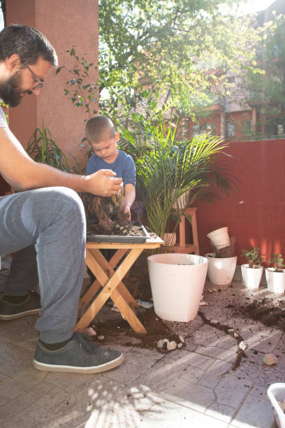 istock Good Care For His Plant 1248729684