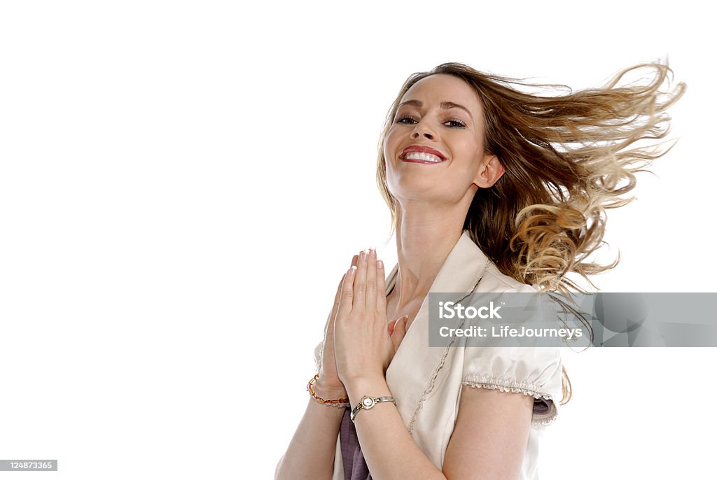 Loving Life Beautiful Woman. Long Hair Blowing In The Wind.  Hands Raised Hands In Prayer. Smiling and energetic. Loving Life. Adult Stock Photo