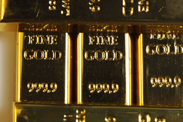 Close up shot of stacked 999.9 pure gold bar ingot on a white background, Close up shot of stacked 999.9 pure gold bar ingot on a white background, represented the business, invesment and finance concept idea is goldco a reputable company stock pictures, royalty-free photos & images