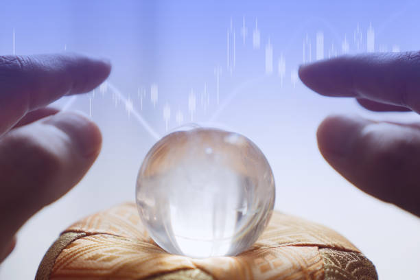 Hand over the crystal ball to predict the future of the market stock photo