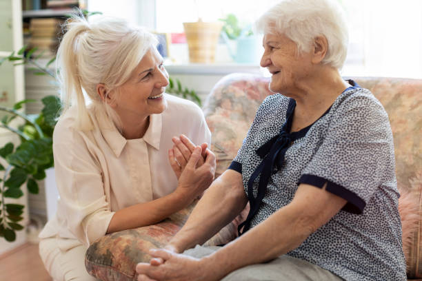 istock Woman spending time with her elderly mother 1248739731
