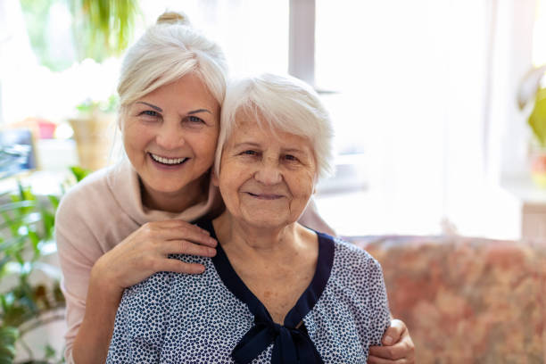 istock Woman spending time with her elderly mother 1248740148