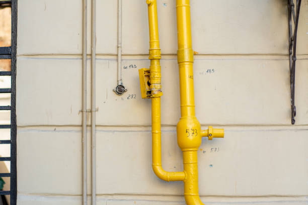 istock Yellow gas pipe outside the building 1248740469