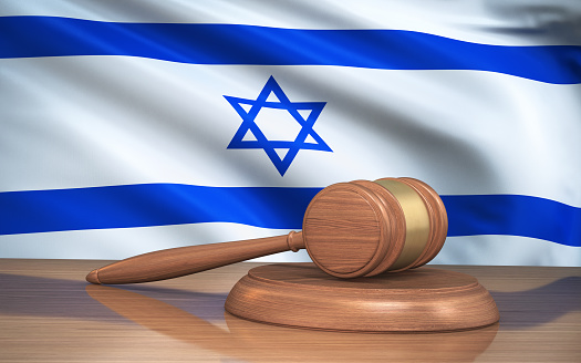 Israel business, politics, cooperation and travel concept. Hand on flag of Israel background.