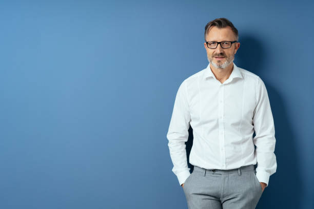 istock Relaxed bearded man posing with hands in pockets 1248747201