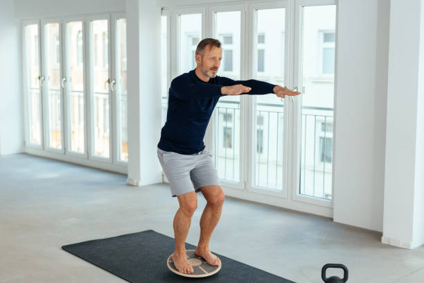 Man doing balance and muscle control exercises
