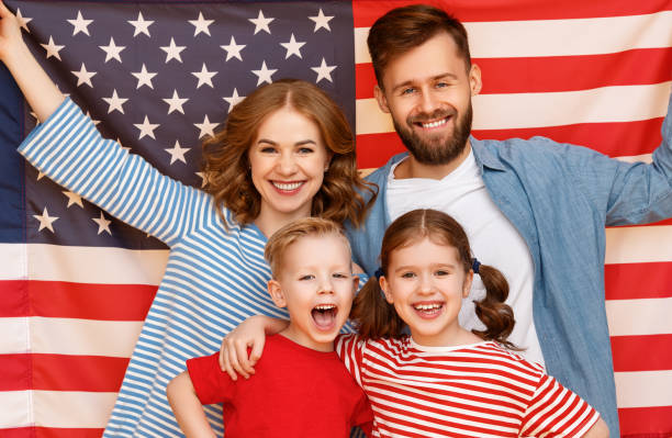 istock Happy family against USA flag 1248751973