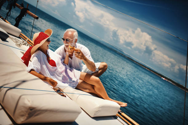 istock Senior couple on a sailing cruise 1248753620