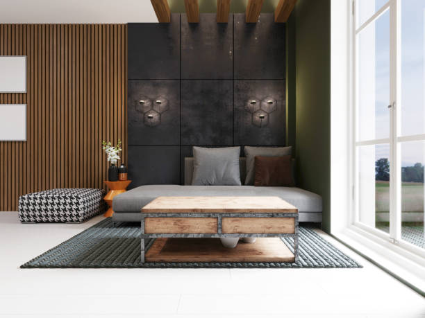 istock Modern sofa with ottoman in the loft interior. Designer wooden table and carpet. Dark concrete panel and wooden planks on the wall. 1248753632