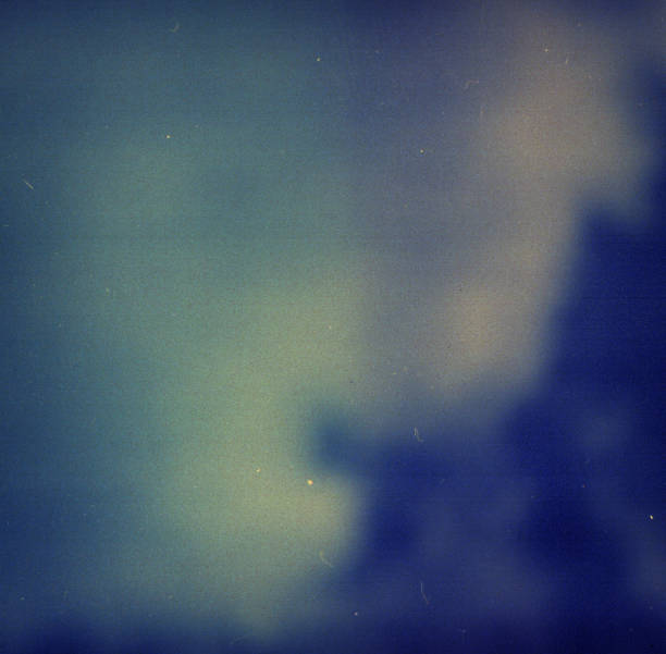 istock Noisy blue film frame with scratches, dust and grain 1248755080