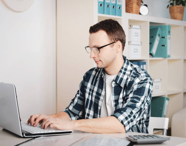 istock young businessman in the workplace 1248756956
