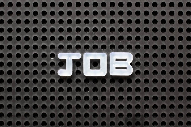 istock Black color pegboard with white letter in word job 1248757646