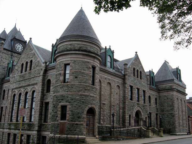 istock Stone courthouse with clock tower on Duckworth street in St. John’s Newfoundland Canada 1248762196