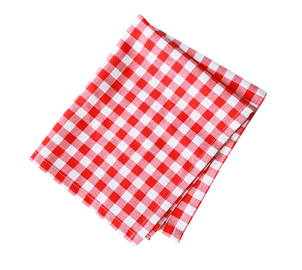 Red checkered folded cloth isolated.Picnic kitchen towel on white background.