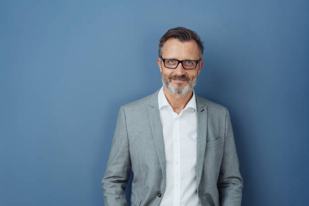 istock Smiling friendly professional man wearing glasses 1248767676
