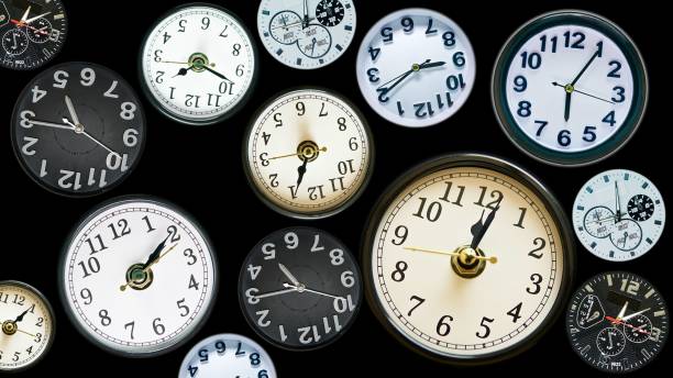 istock Many time clock faces appear showing different  time. Various clocks in busy time flow concept. 1248768511