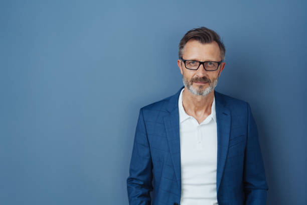 istock Serious businessman wearing glasses staring 1248768833