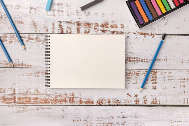 istock Blank sketchbook with copy space. Artistic background, creative art workplace for children kids, top view with copy space, flat lay 1248769274