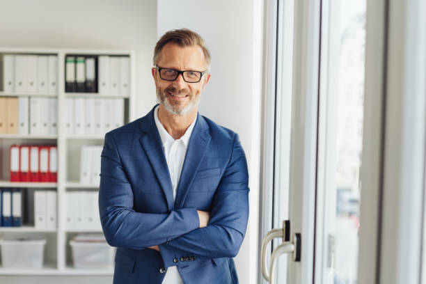 istock Confident stylish businessman with friendly smile 1248769613