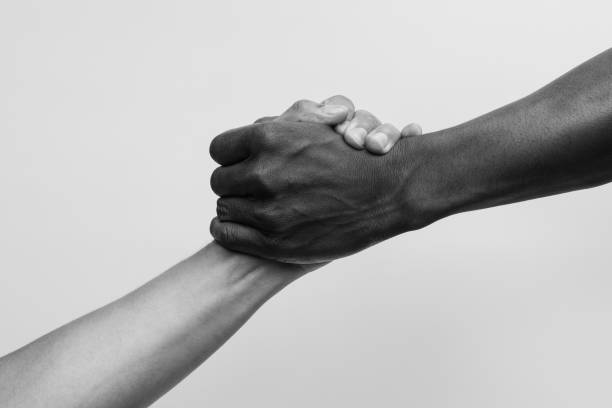 istock Helping hand, Rescue, Black and white image. 1248770933