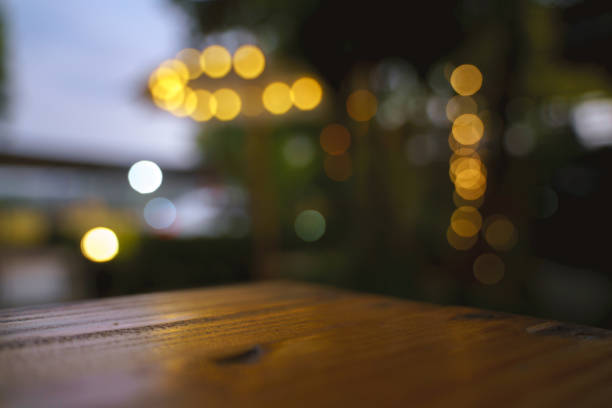 Outdoor Asian style garden with light decoration and wooden furniture