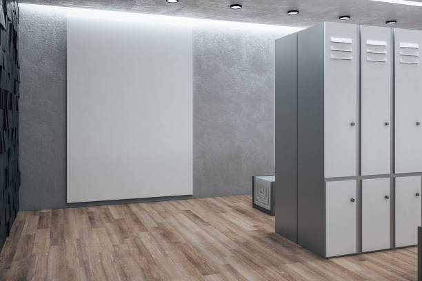 istock Modern locker room with blank poster on wall 1248775916