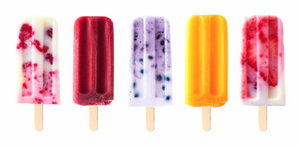 Assorted summer fruit popsicles isolated on white Assortment of cold summer fruit popsicles isolated on a white background flavored ice photos stock pictures, royalty-free photos & images