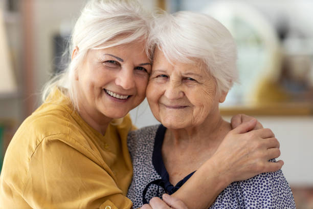 istock Woman spending time with her elderly mother 1248778865