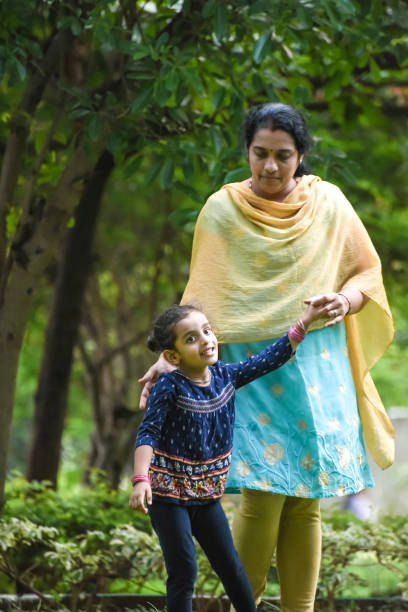 istock Mother And Daughter In Park 1248779484