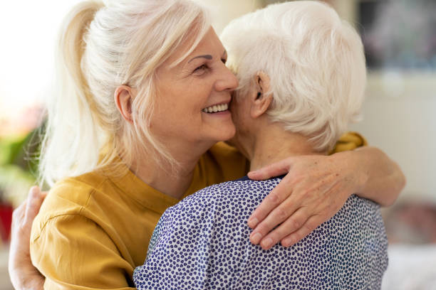 istock Woman spending time with her elderly mother 1248779493