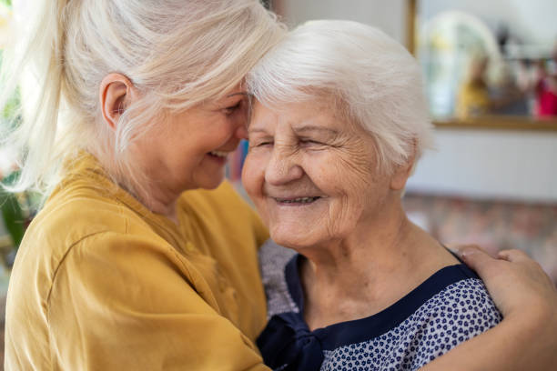 istock Woman spending time with her elderly mother 1248779641