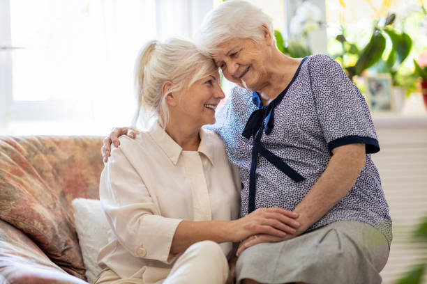 istock Woman spending time with her elderly mother 1248779665