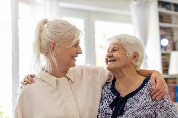 istock Woman spending time with her elderly mother 1248779712