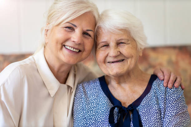 istock Woman spending time with her elderly mother 1248779993