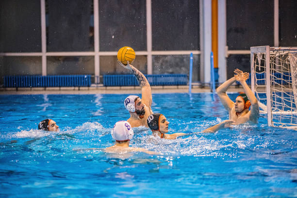 istock Young men playing water polo 1248780780