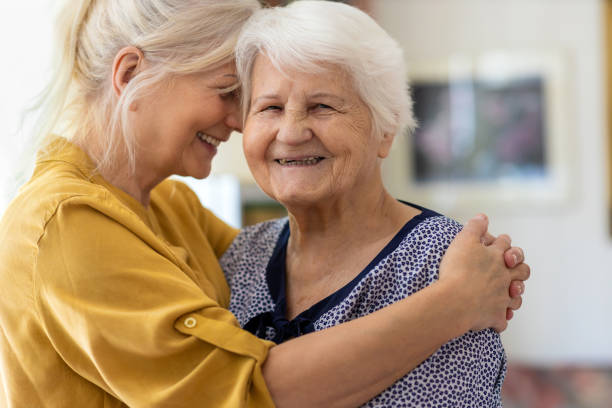 istock Woman spending time with her elderly mother 1248780939