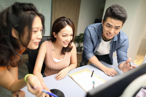 istock Group of business persons in discussion 1248780986